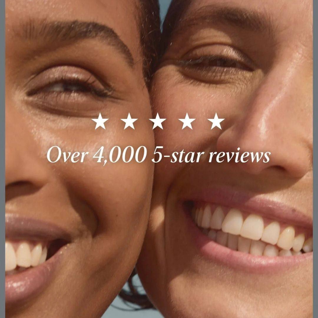 Two women with glowing skin representing over 4,000 five-star reviews for Alpha-H Liquid Gold
