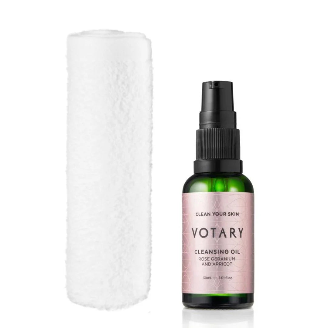Votary Cleansing Oil Rose Geranium & Apricot Mini 30ml – lifestyle shot: mini bottle styled alongside the full-size 100ml