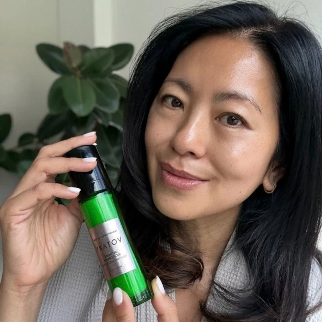 Votary Ultimate Rich Cream with ceramides and peptides held by model showing hydrated, radiant-looking skin