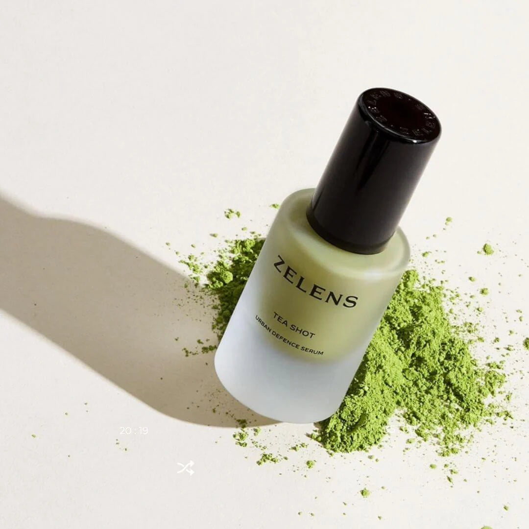 Zelens Tea Shot Urban Defence Serum 10ml – lifestyle shot: serum bottle styled in a premium urban skincare setting on neutral background