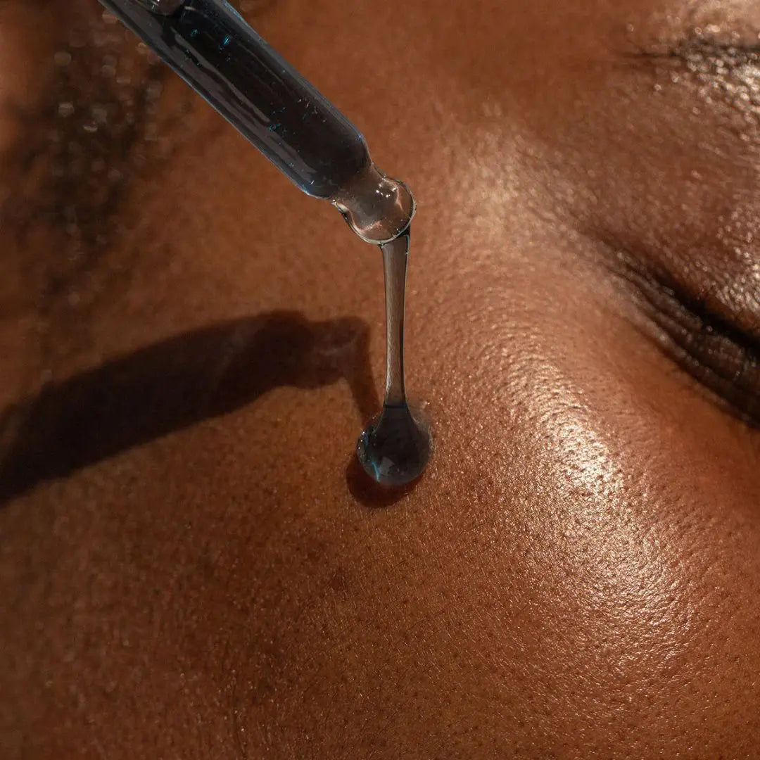 Close-up of Alpha-H Vitamin B Serum drop, lightweight hydrating formula