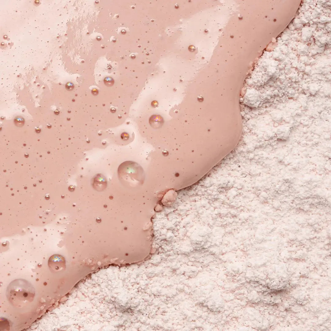 Exfoliating enzyme polish Alpha-H on radiant pink powder