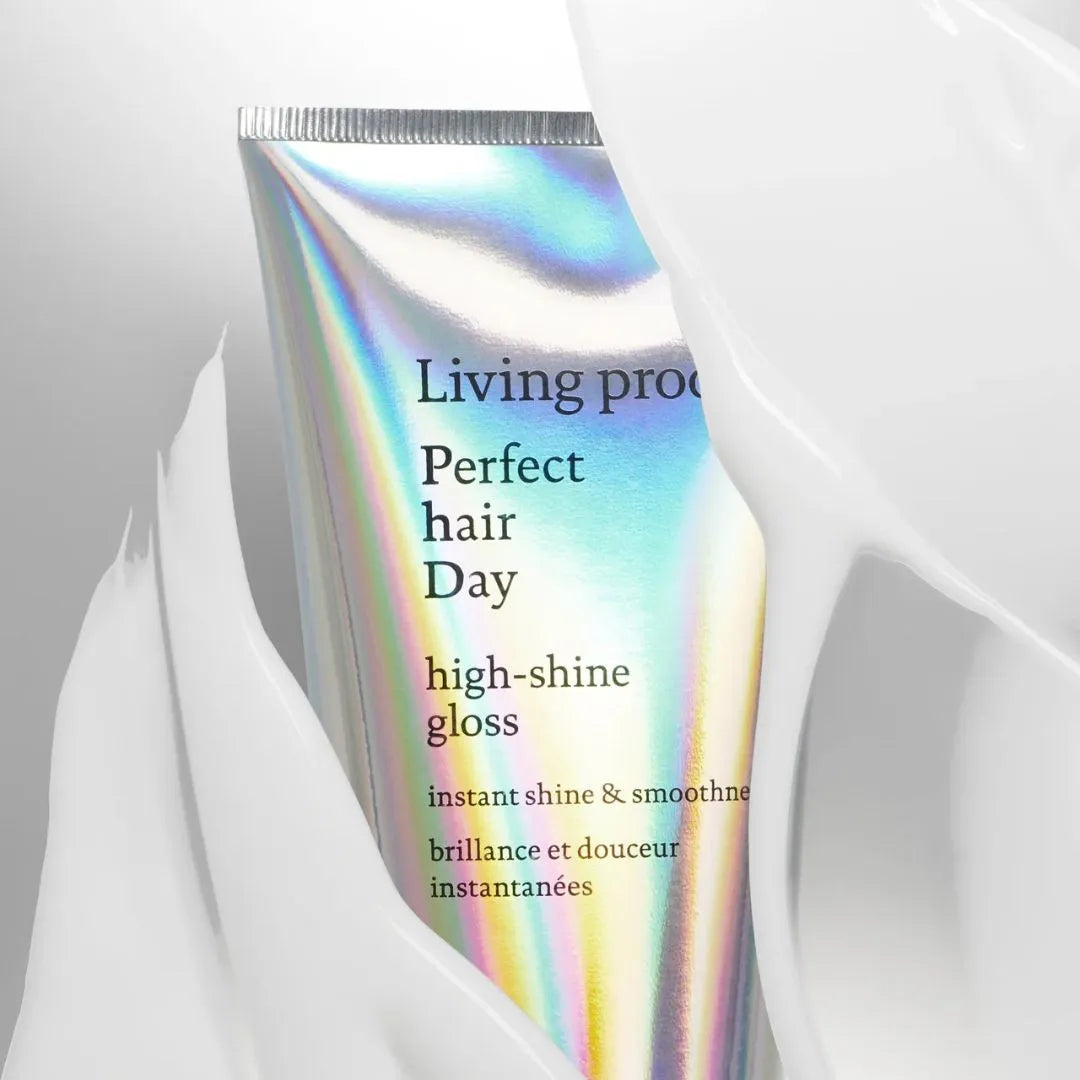 Living Proof Perfect Hair Day high-shine gloss with colorful label on a white background