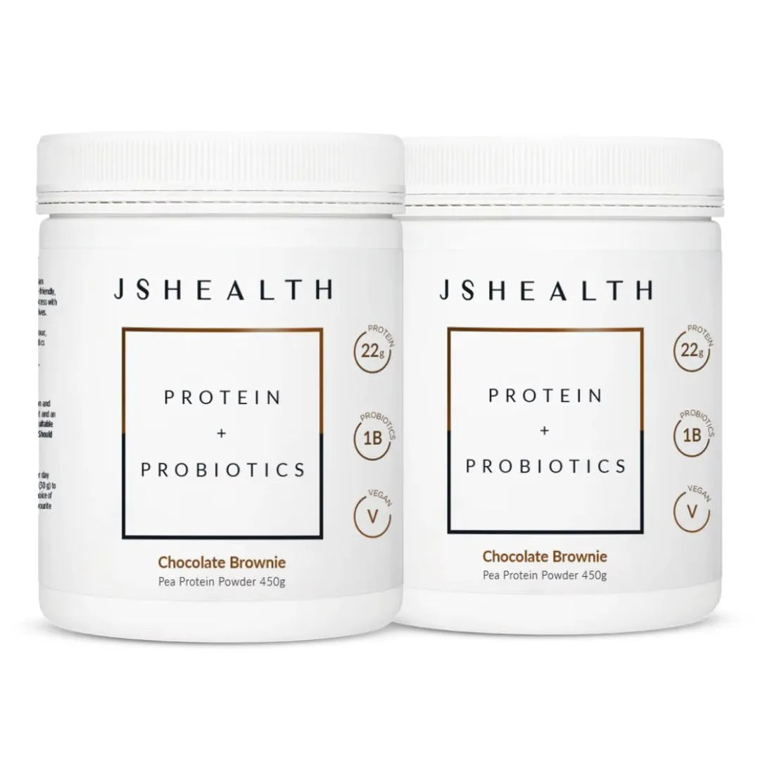 Two containers of JSHealth Protein + Probiotics Chocolate Brownie flavor on a white background