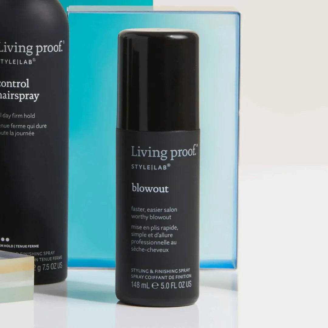 Living Proof hair product bottles on a white background