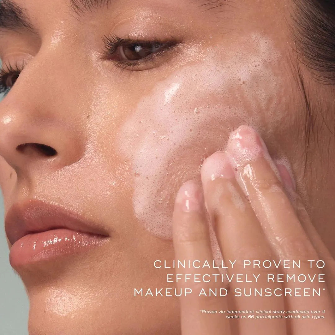 Close-up of a person applying skincare product to their face with text about its effectiveness.