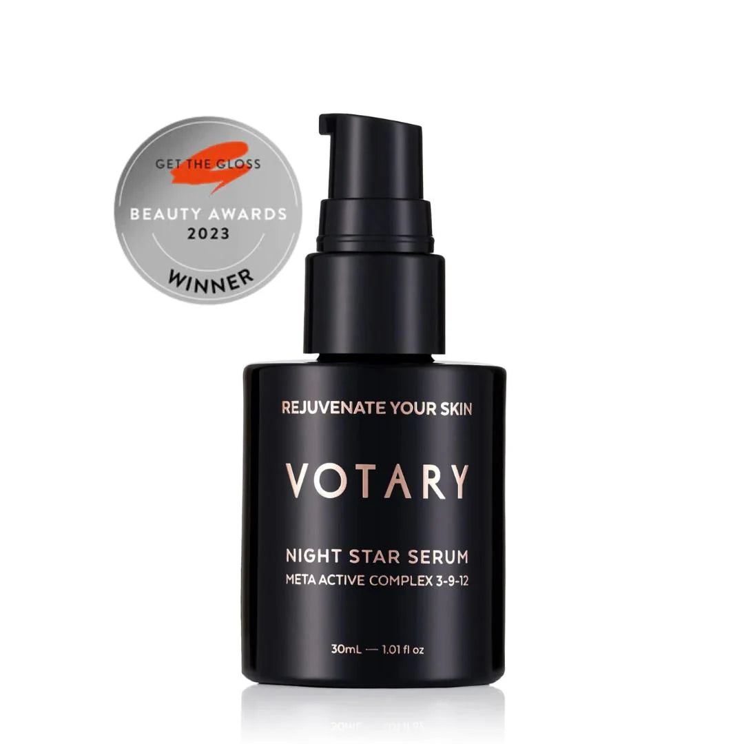 Votary Night Star Serum in a matte black pump bottle, featuring a silver 'Get The Gloss Beauty Awards 2023 Winner' badge on the top left, set against a clean white background.