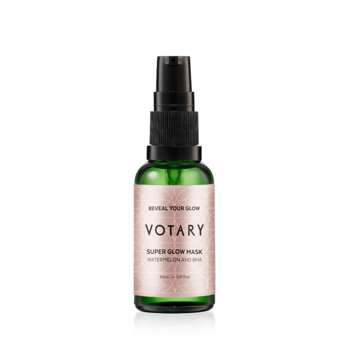 Votary Super Glow Mask spray bottle, featuring a green glass bottle, black spray nozzle, and a pale pink label with black text.