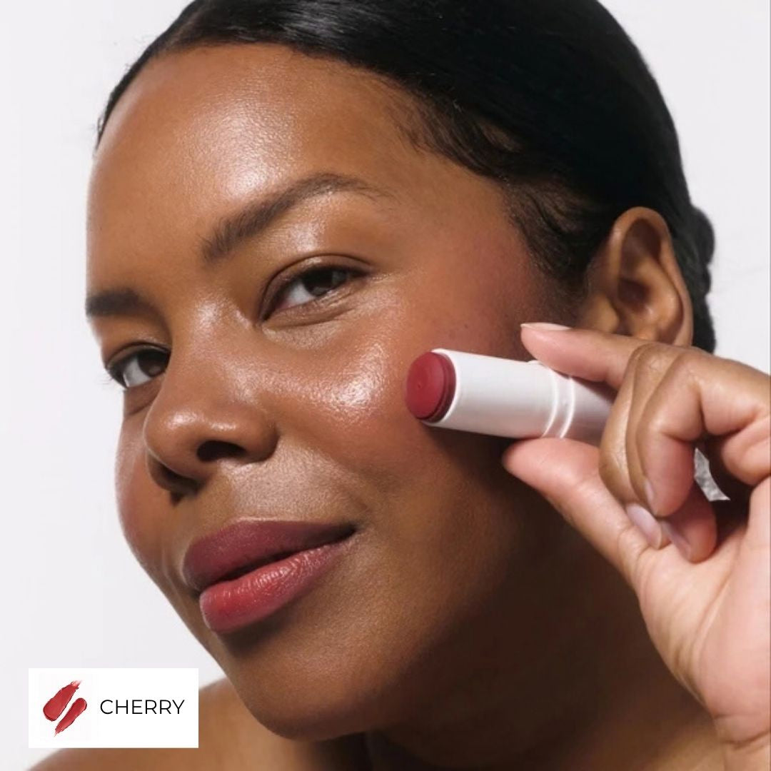 Votary Lip & Cheek Tint in Cherry, cherry-colored shown on cheek