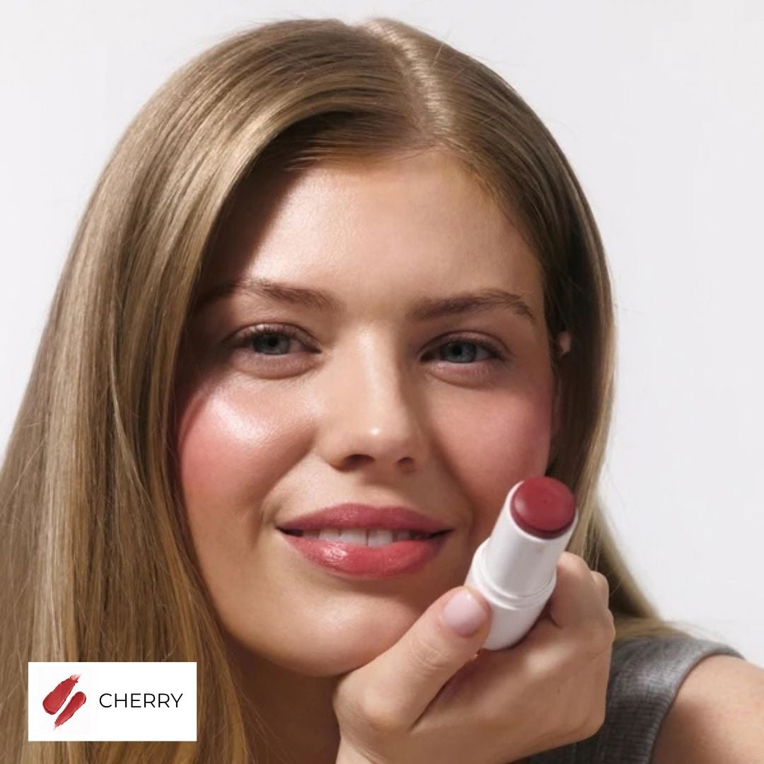 Votary Lip & Cheek Tint in Cherry dusty rose-red tip applied to cheek