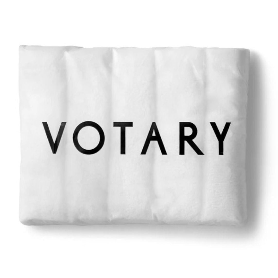 Pack of five white Votary Face Cloths in branded Votary packaging