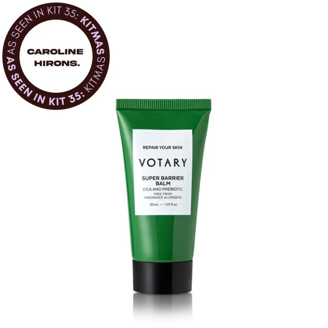 Green tube of Votary Super Barrier Balm on a white background with a circular badge featuring Caroline Hirons' name.