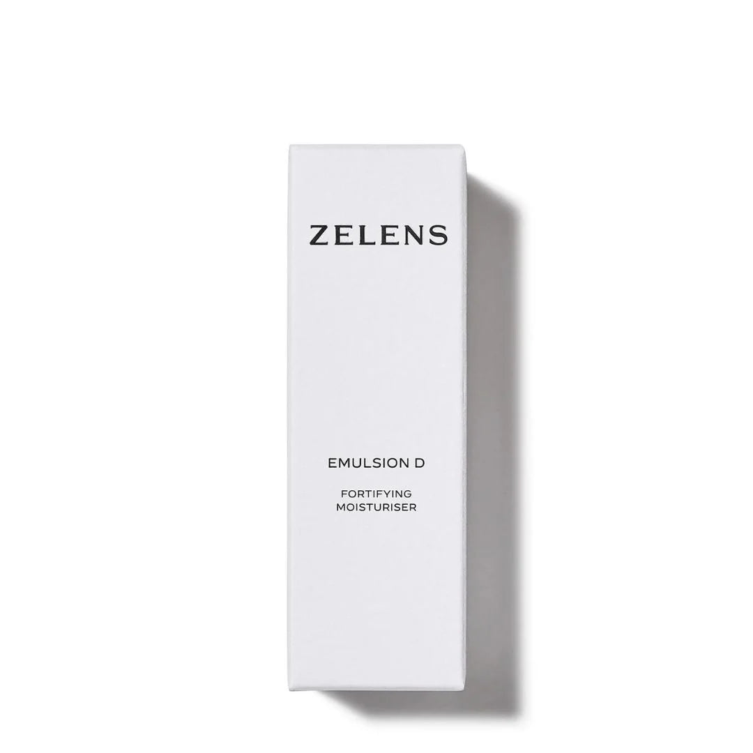 A tall, minimalist white rectangular box for ZELENS Emulsion D Fortifying Moisturiser, featuring black text and a soft shadow on a clean white background.