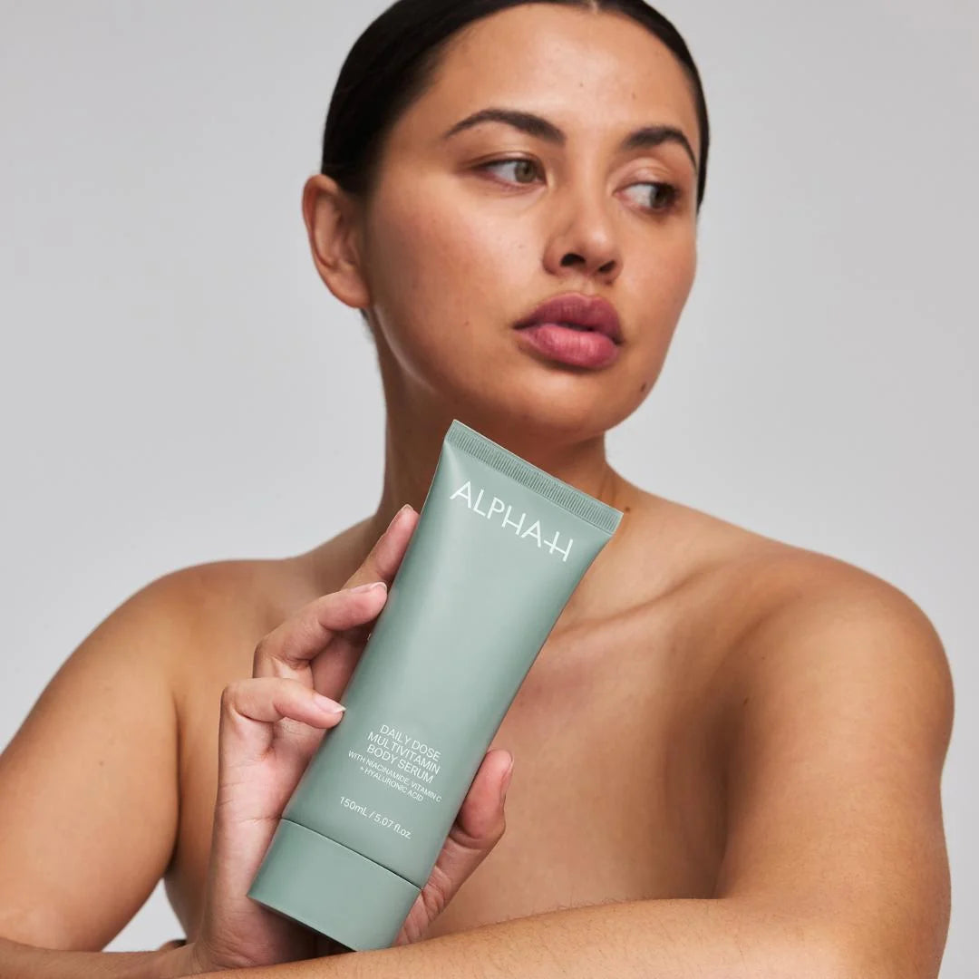 Alpha-H Daily Dose Multivitamin Body Serum 150ml – key ingredients infographic: vitamins A, B, C and E with peptide complex