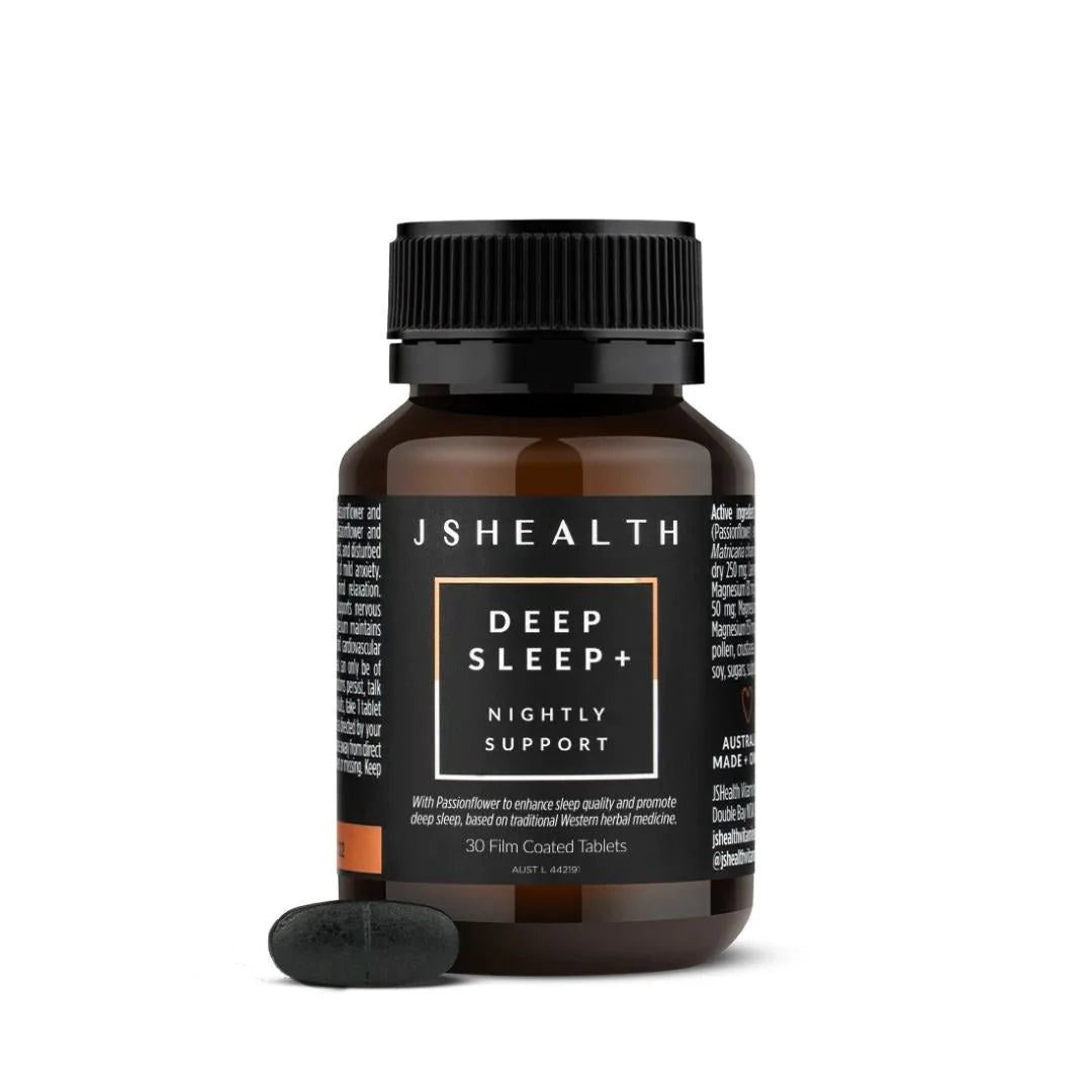 JSHealth Deep Sleep + Nightly Magnesium Support 60 Tablets – lifestyle shot: tablet on marble nightstand with soft evening lighting