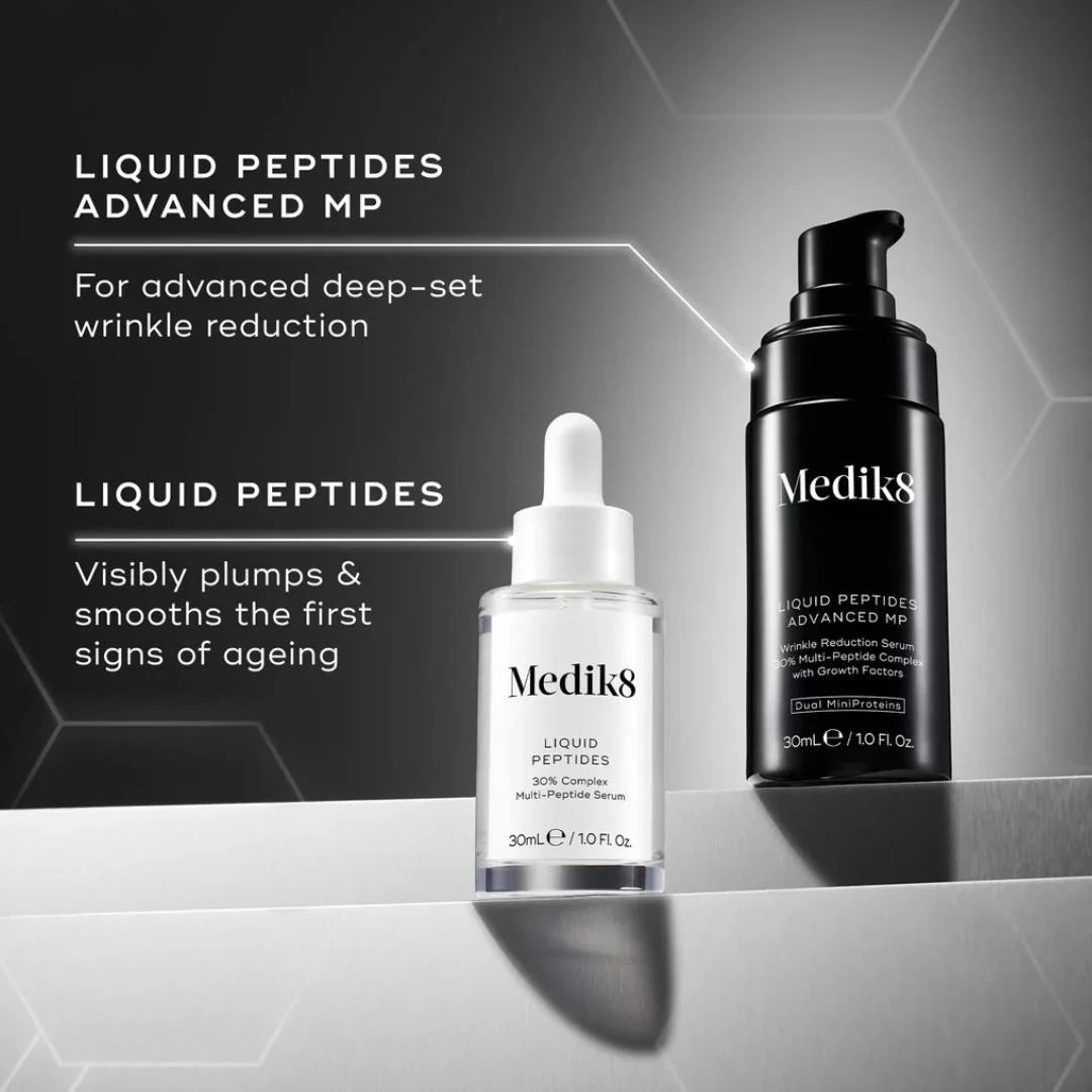 Medik8 Liquid Peptides Advanced MP 30ml – lifestyle shot: serum bottle styled in a premium anti-ageing skincare setting